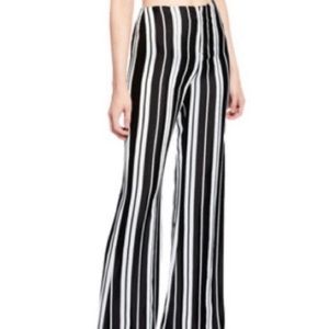 Flattering Alice+Olivia black & white stripe, high-waist, flare pants! Brand new